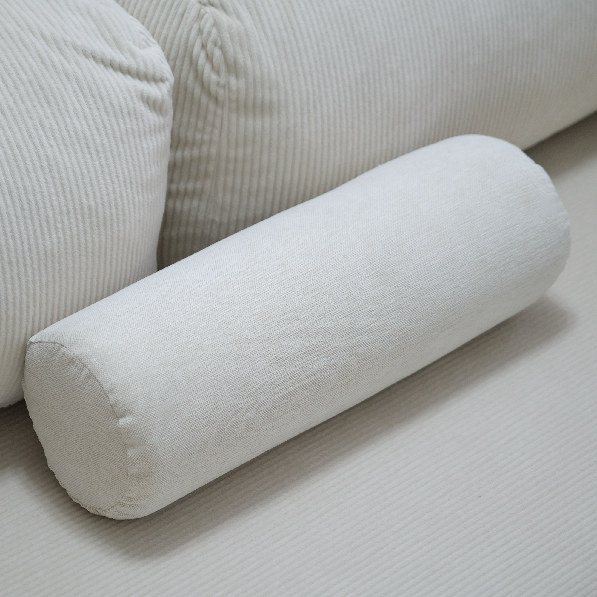 Round Bolster Cushion Adding Comfort And A Modern Decorative Touch